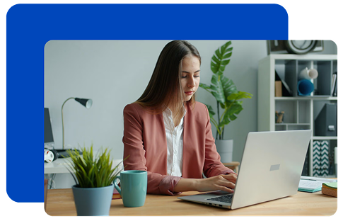Business owner working at a laptop